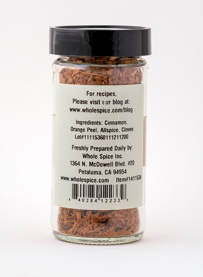 Whole Spice Inc.'s Apple Cider Spice comes in a glass jar with a black lid, featuring cinnamon, orange peel, allspice, and cloves—ideal for hot mulled cider. Check the label or website for contact info and tasty seasonal recipes.