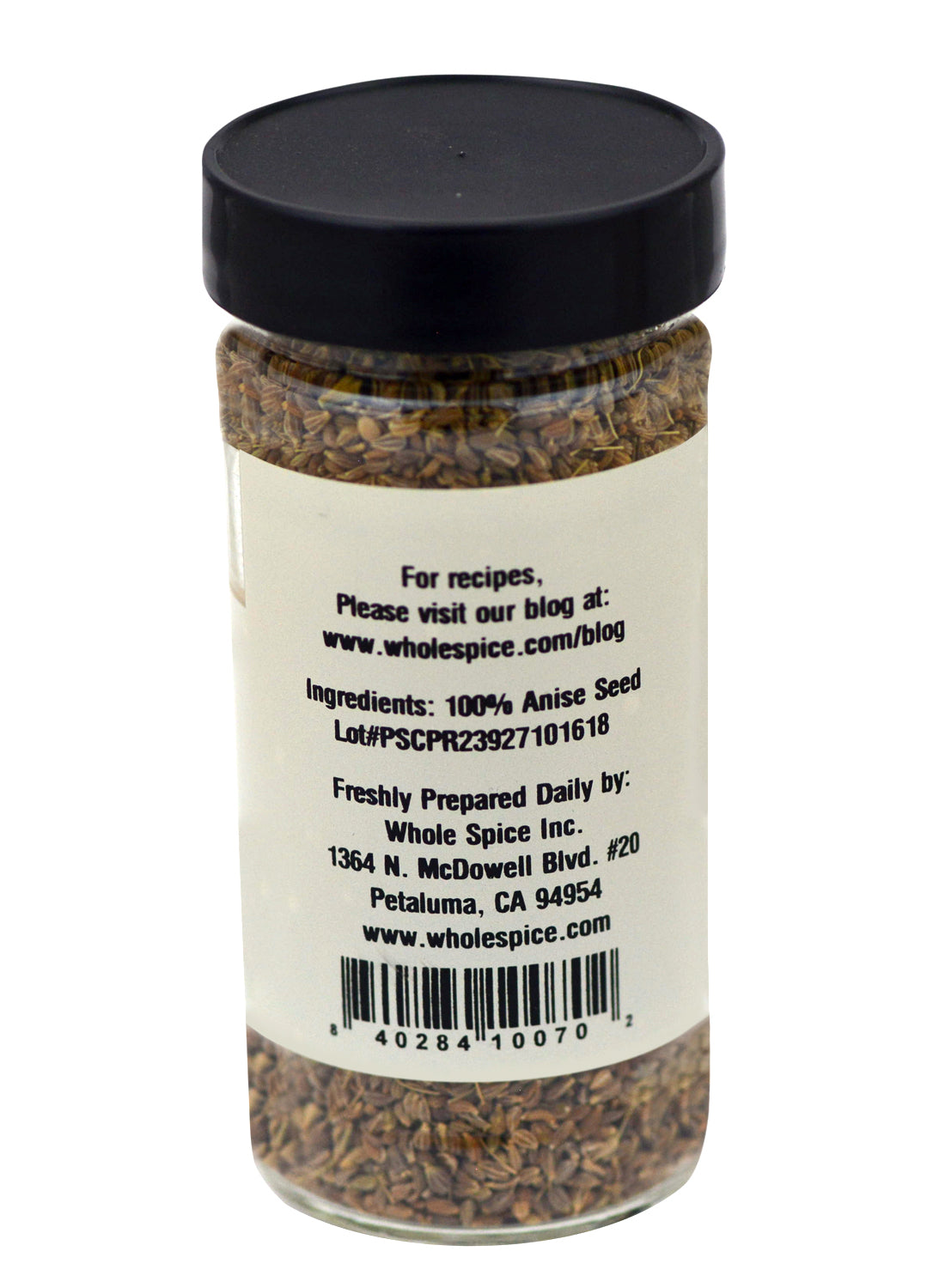 A jar of Whole Spice Inc. Anise Seed, known for its licorice flavor often used in Moroccan cookies.