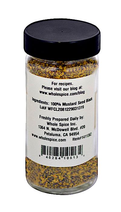 Whole Spice Inc. Black Mustard Seed Coarse Ground comes in a clear glass jar with a black lid and label listing ingredients, contact info, and barcode. Perfect for seasoning barbecue sauces or grinding further for recipes.