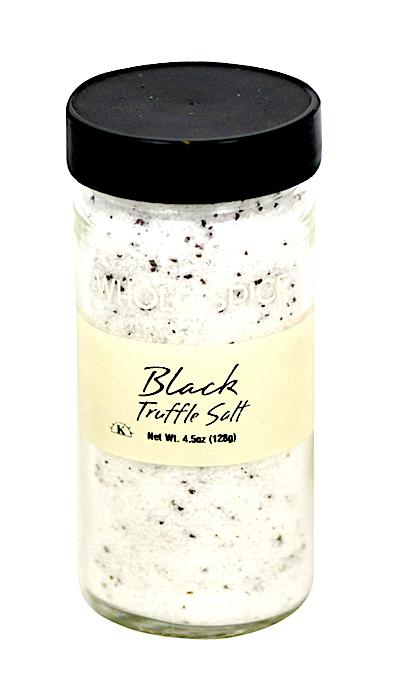 A clear glass jar with a black lid contains Whole Spice Inc. Black Truffle Salt, white and flecked with black. The label shows the 4.5 oz (128g) net weight—ideal for gourmet or flavored salt lovers.