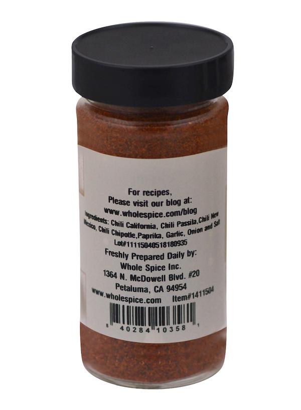 Whole Spice Inc.'s Chili BBQ Spice Rub comes in a clear jar with black lid and white label listing chili, paprika, garlic, onion, and salt—ideal for grilling or meat rub. Preparation instructions and barcode are included.