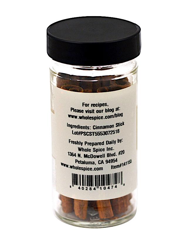Whole Spice Inc. Cinnamon Sticks 4 inch come in a clear jar with a black lid, containing whole Cassia cinnamon (Cinnamomum burmanii). The label includes "cinnamon stick" as the ingredient plus company info, recipe website, and barcode.