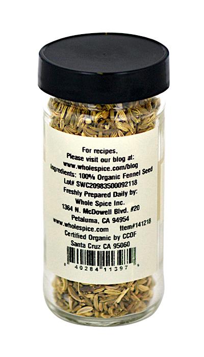 Whole Spice Inc. offers Fennel Seeds Organic in a clear glass jar with a black lid. The label features ingredients, brand details, certifications, and website. Proudly made by this California-based company.