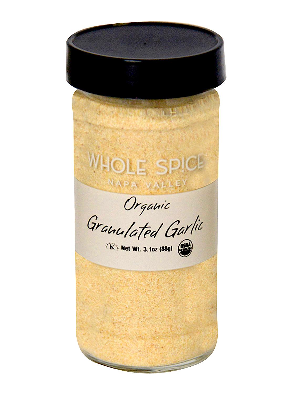 A jar of Whole Spice Inc. Garlic Granulated with a black lid features a beige and white label showing the product name, 3.1 oz (88g) weight, and USDA Organic seal—ideal for all your dehydrated garlic needs.