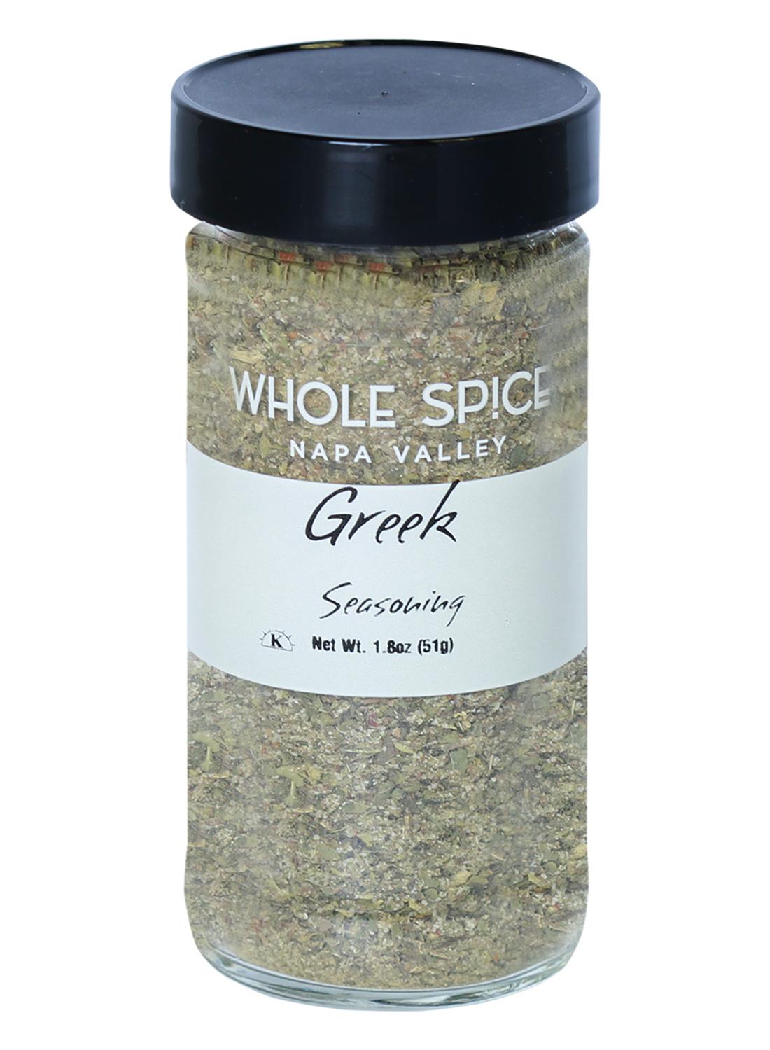A 1.8 oz glass jar of Whole Spice Inc. Greek Seasoning with a black lid, featuring a blend of dried herbs and spices ideal for meat rubs or adding bold flavor to pasta salads.