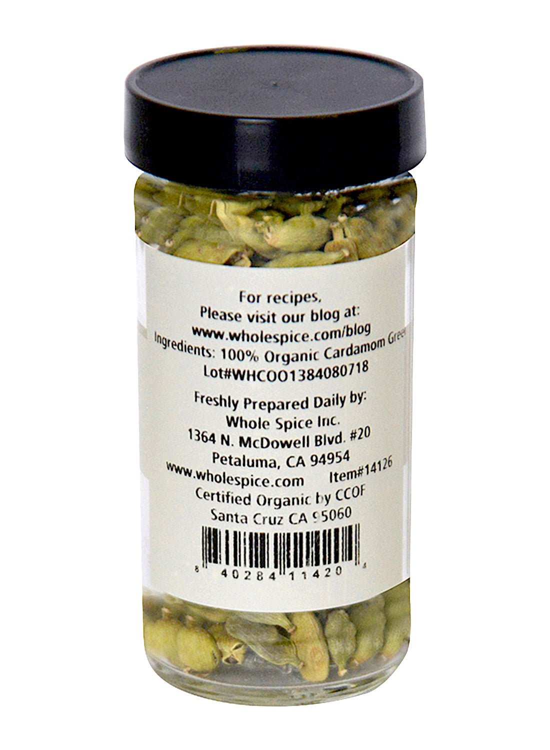 Whole Spice Inc. Green Cardamom Pods Organic come in a clear glass jar with a label listing 100% organic cardamom spice, preparation tips, certification details, and contact info—ideal for baking.