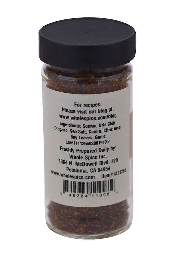 Whole Spice Inc.'s Istanbul Salad Seasoning comes in a clear jar with a black lid and label listing sumac, urfa chili, oregano, and more—ideal for Turkish salad fans. Contact info for Whole Spice Inc., Petaluma, CA, is included.
