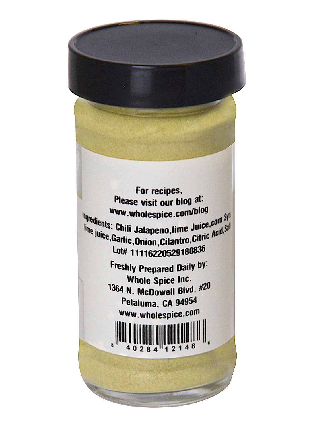 A Whole Spice Inc. Jalapeño Lime Seasoning jar with a black lid and label listing ingredients like jalapeño chili, lime juice, garlic, onion, cilantro, citric acid, sea salt, plus the manufacturer's contact info.