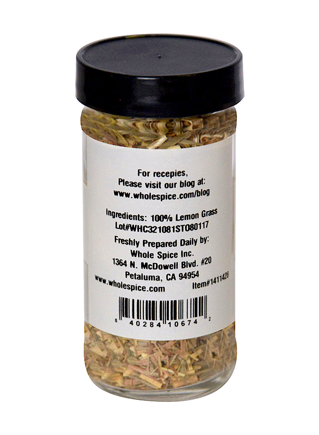 Whole Spice Inc. Lemon Grass comes in a clear jar with a black lid, containing 100% dried lemon grass—ideal for Thai and South Asian dishes. The label includes contact and location info for Whole Spice Inc., Petaluma, CA.