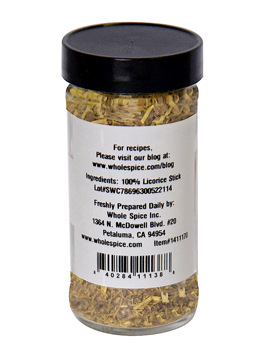 A clear spice jar with a black lid contains Licorice Sticks Chopped by Whole Spice Inc. The label states 100% licorice stick as the ingredient and lists contact information for Whole Spice Inc., Petaluma, CA.