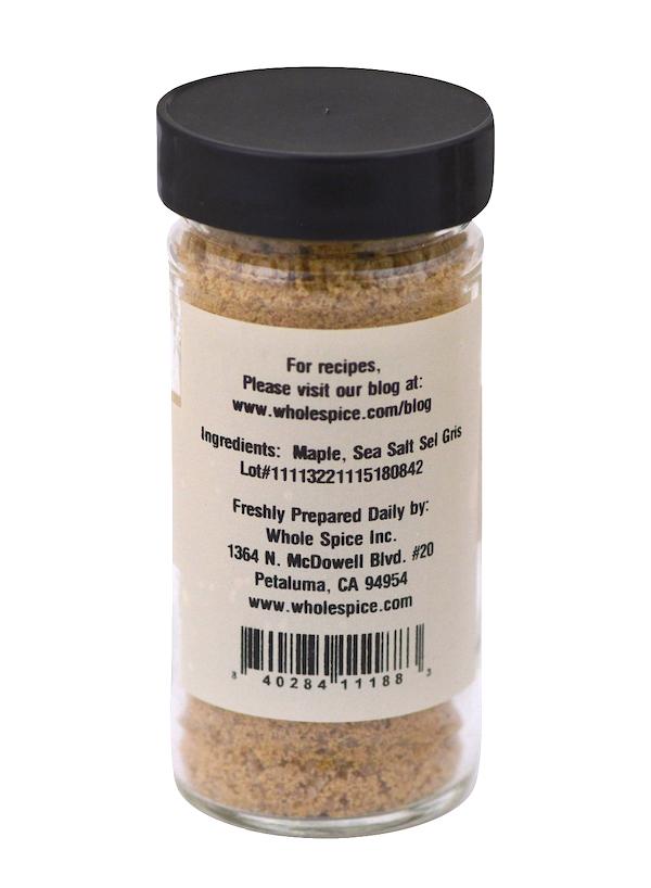 Whole Spice Inc. Maple Salt is a jar of ground brown powder, ideal as a gourmet seasoning or for adding a touch of maple flavor to your favorite dishes.
