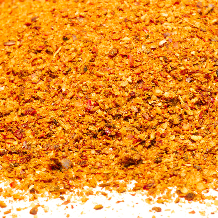 Whole Spice Inc. Merguez Sausage Rub on a white background, ideal for making authentic Moroccan sausages or adding bold Moroccan flavor to your favorite dishes.