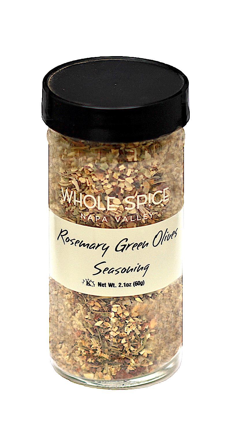 Whole Spice Inc.'s Rosemary Green Olives Seasoning comes in a jar with a black lid, infused with zesty lemon peel for a fresh, vibrant flavor.