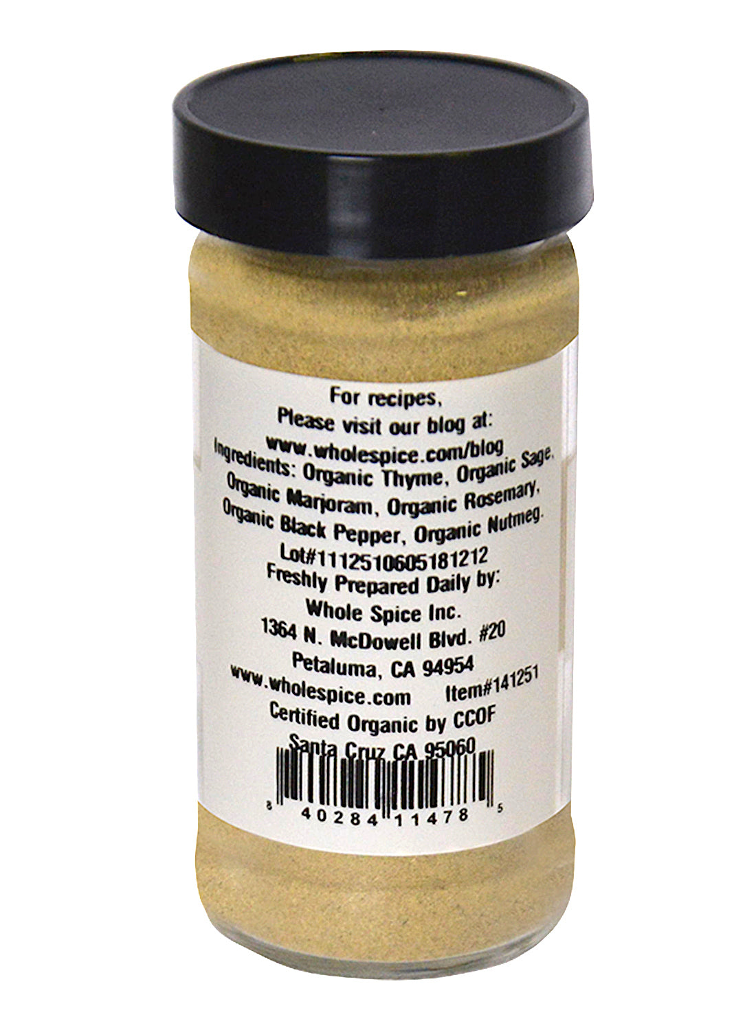 A glass jar of Poultry Seasoning Organic by Whole Spice Inc., with a black lid and light brown powder. The label features organic herbs, preparation tips, website, and Petaluma, CA address—ideal as an herb seasoning or poultry rub.