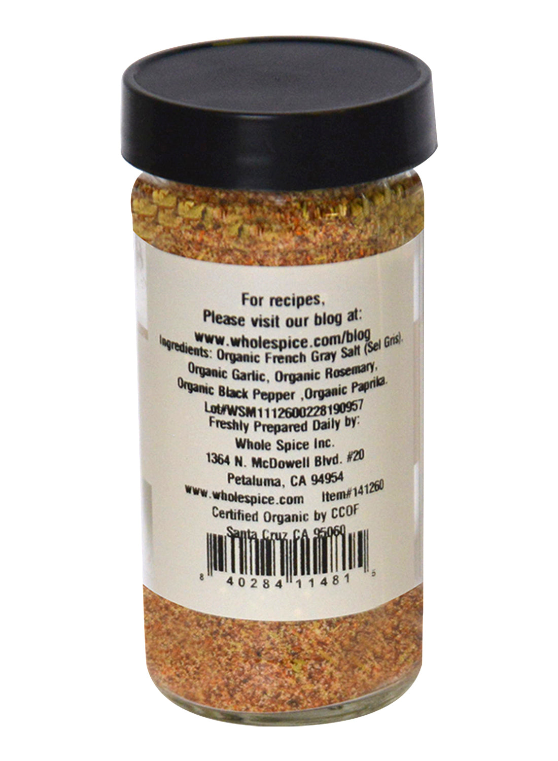 Whole Spice Inc.'s Roasted Chicken Blend Organic comes in a clear jar with a black lid, featuring a label listing French gray salt, garlic, rosemary, black pepper, and paprika—ideal as a chicken rub. Company contact info appears on the label.