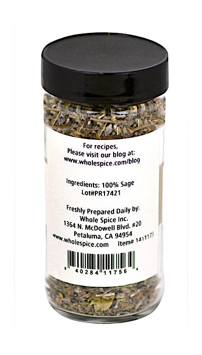 A clear spice jar with a black lid holds Whole Spice Inc. Sage—100% dried sage leaves, a classic Mediterranean herb. The label includes company info from Petaluma, CA and a blog URL with recipes.
