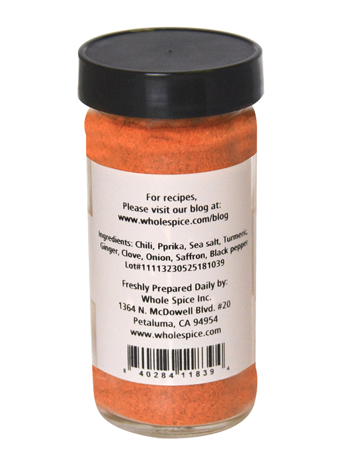 A glass jar of Seafood Batter Seasoning by Whole Spice Inc., filled with orange powder and topped with a black lid. The label lists ingredients like chili, paprika, sea salt, turmeric—ideal for seasoning fish. Back includes company info and barcode.