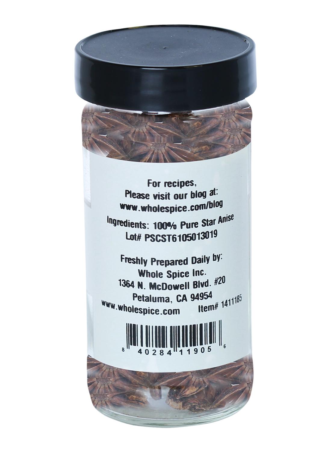 Whole Spice Inc. Star Anise comes in a clear glass jar with a black lid, filled with whole seeds—ideal for pho or five-spice. The label states 100% pure star anise and includes manufacturer and contact info.