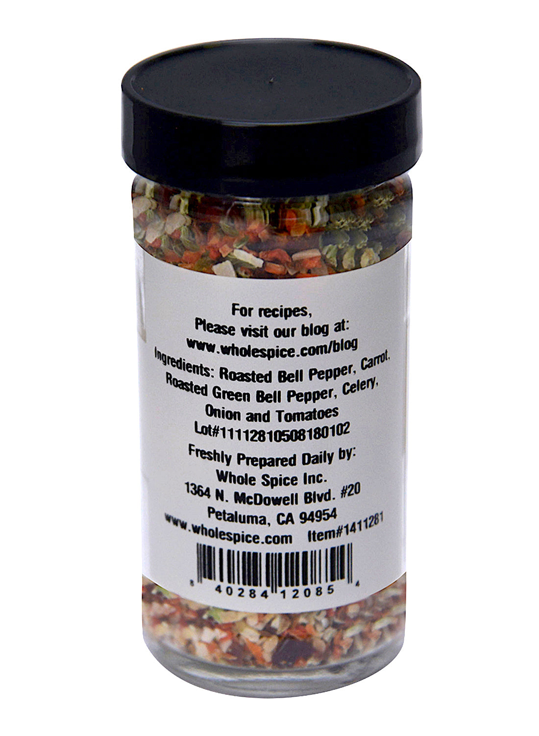 Whole Spice Inc. Vegetable Flakes come in a clear jar with a green lid, featuring roasted bell pepper, carrot, celery, onion, and tomatoes—ideal for soups. Label includes company contact and location details.