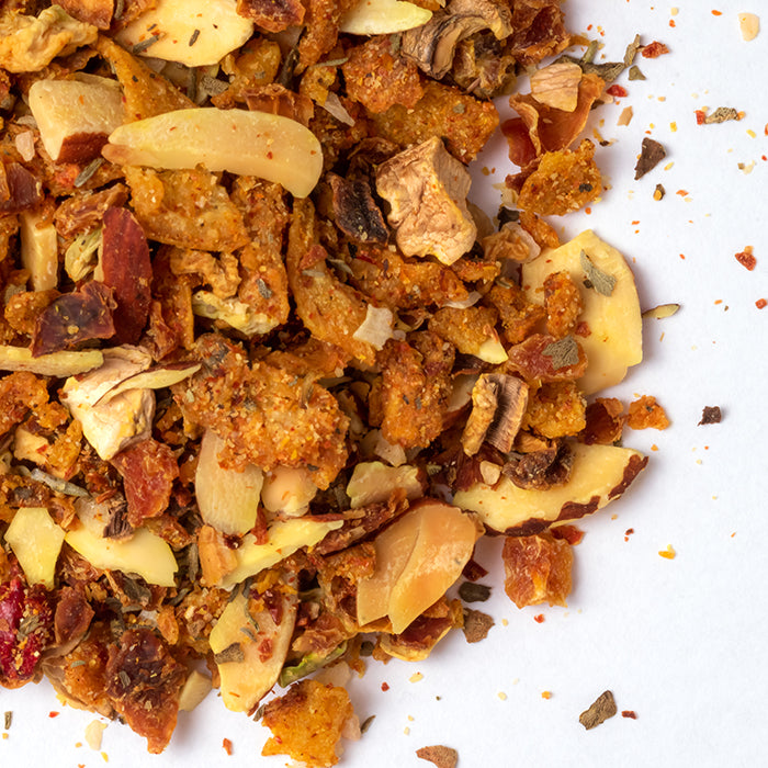 A dish seasoned with Whole Spice Inc. Mediterranean Israeli Couscous Seasoning sits on a white surface.