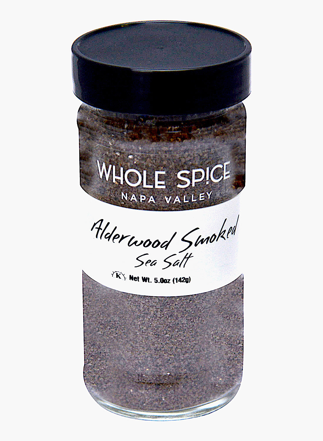 A 5 oz clear glass jar with black lid labeled Whole Spice Inc. Alderwood Smoked Sea Salt, featuring dark smoked Pacific sea salt slow-smoked over Alaskan Alderwood, ideal as a finishing salt.