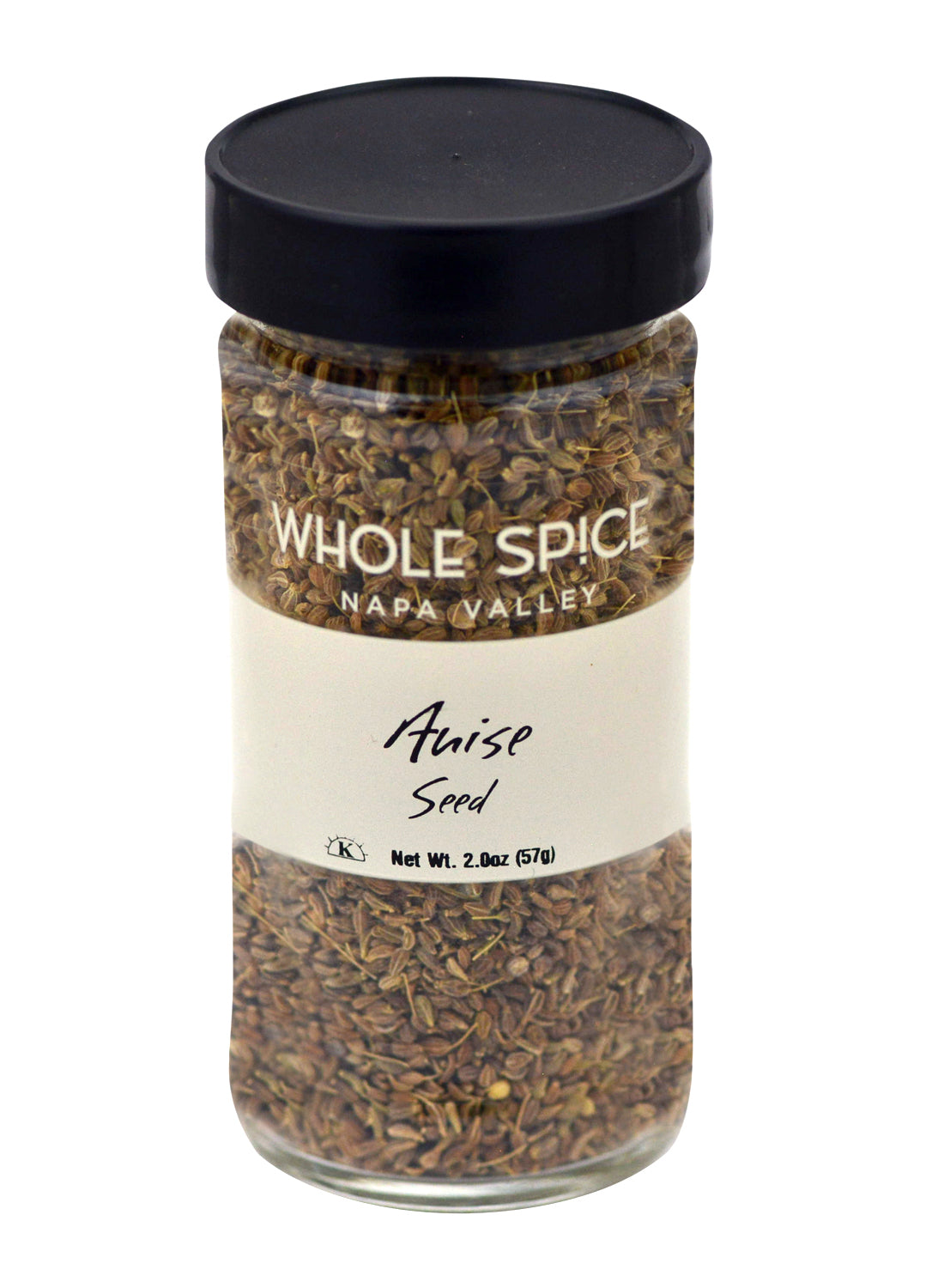 A clear glass jar with a black lid contains brown Whole Spice Inc. Anise Seed, Net Wt. 2.0oz (57g)—known for licorice flavor and ideal for Moroccan cookies and baked treats.