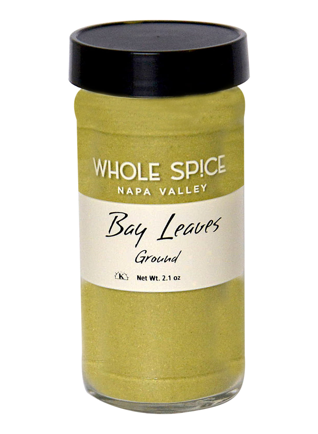 A clear jar with a black lid contains Bay Leaves Ground by Whole Spice Inc., Net Wt. 2.1 oz. The light greenish powder is made from ground laurus nobilis leaves.