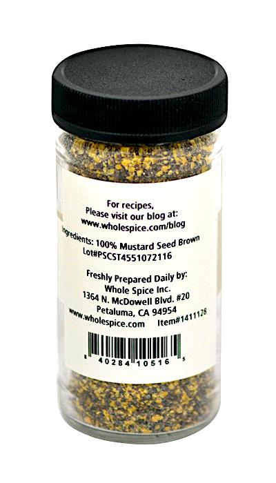 Whole Spice Inc. Brown Mustard Seed Coarse Ground comes in a clear spice jar with a black lid. The label shows 100% brown mustard seed, producer’s info, and barcode—perfect for curries or as a spicy seasoning.