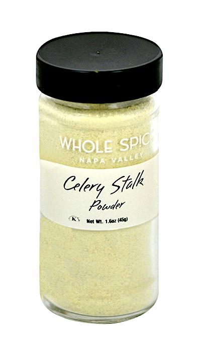 A clear glass jar with a black lid holds light yellow Celery Stalk Powder by Whole Spice Inc., Net Wt. 1.6oz (45g), ideal for seasoning dishes or enhancing vegetable juices.