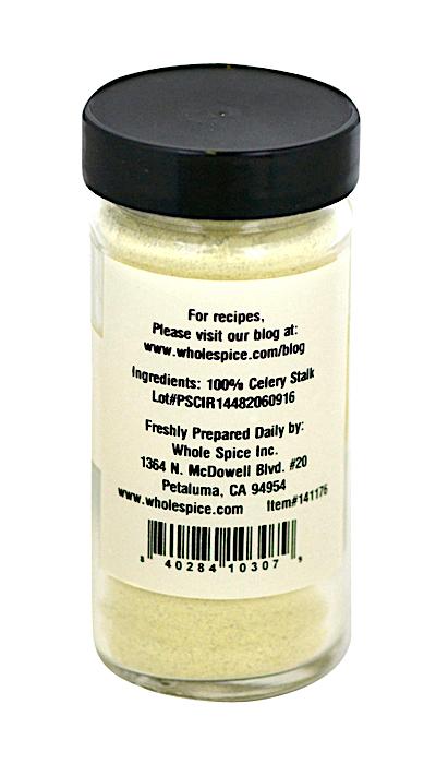 A clear spice jar with a black lid holds pale yellow Celery Stalk Powder. The label shows "100% celery stalk," along with Whole Spice Inc.’s contact details and website.