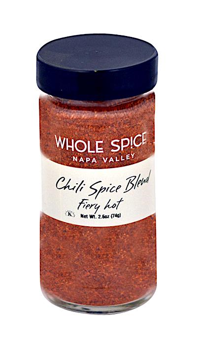 A jar of Chili Spice Blend - Fiery Hot by Whole Spice Inc., featuring vibrant red crushed chile peppers.