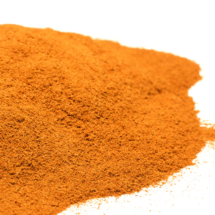 A pile of brown powder, perfect for Indian cooking—this could be the finely ground Cinnamon Powder Organic from Whole Spice Inc.