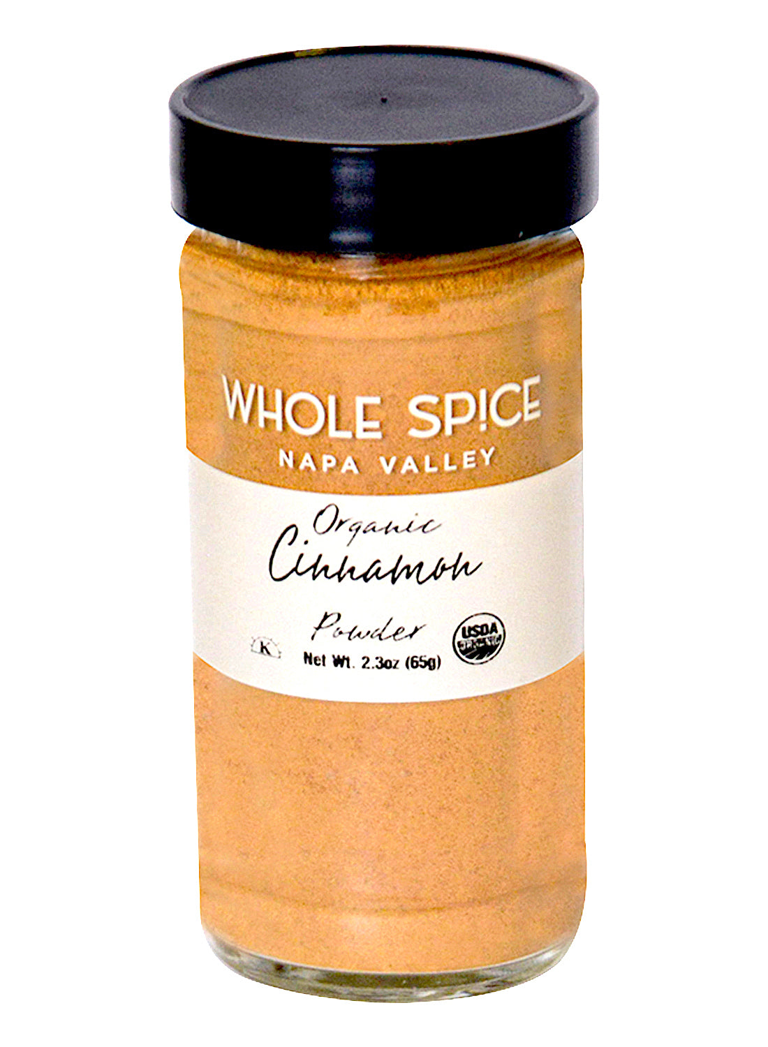 A 2.3 oz (65g) glass jar of Whole Spice Inc. Cinnamon Powder Organic with a black lid and white label, featuring the USDA Organic seal—ideal for Indian cuisine or enhancing Garam Masala blends.