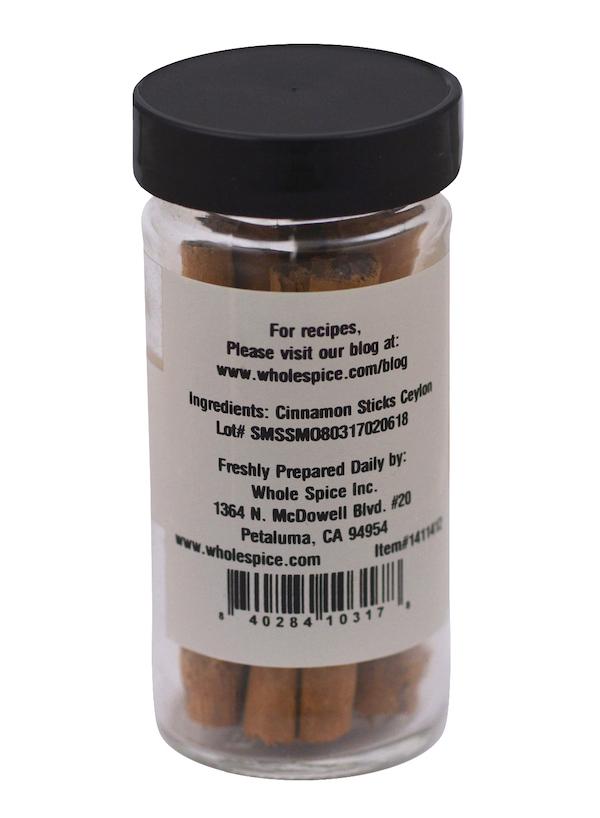 Whole Spice Inc. Cinnamon Sticks Ceylon come in a clear plastic jar with a black lid. The label features ingredients, company details, and their website for recipes. Perfect for baking or enjoying natural anti-inflammatory benefits.