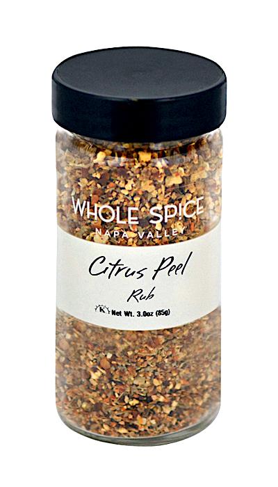Whole Spice Inc. Citrus Peel Rub comes in a jar with a black lid, making it the perfect citrus seasoning to elevate your dishes.