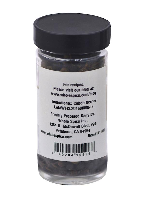 A jar of Whole Spice Inc. Cubeb Berries, also known as Java pepper or tailed pepper, with a label featuring aromatic berries.
