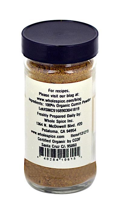 A bottle of Whole Spice Inc. Cumin Powder Organic, perfect for adding bold flavor to your dishes—try it in curries or alongside Garam Masala.
