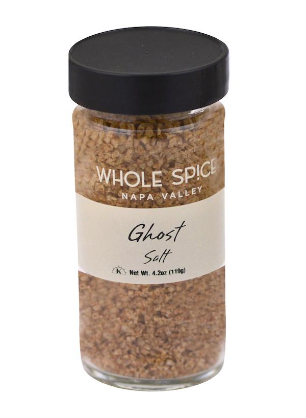 Whole Spice Inc. Ghost Salt combines spicy Ghost Chili with premium salt in a jar topped with a black lid, perfect for those seeking intense heat and bold flavor in their dishes.