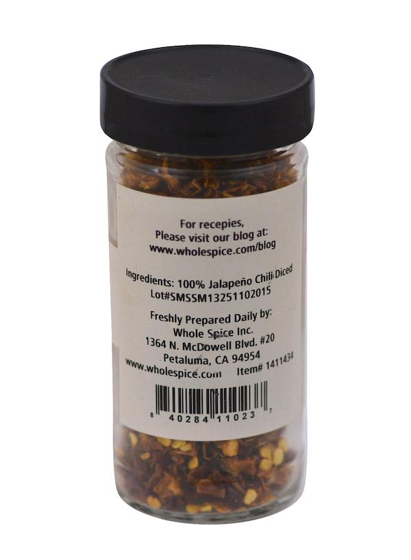 Whole Spice Inc. Jalapeño Red Chili Diced comes in a clear jar with a black lid; label lists 100% jalapeño chili and Petaluma, CA contact info—ideal for spicing up your chili stew.