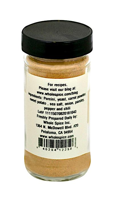 Whole Spice Inc. Porcini Mushroom Rub comes in a clear jar with a black lid and label listing ingredients like porcini mushroom, yeast, and carrot powder—ideal as a seasoning or rub. Preparation instructions and contact info are also included.