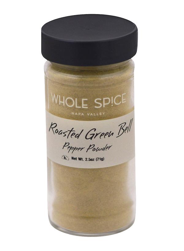 A glass jar with a black lid labeled Whole Spice Inc. Roasted Green Bell Pepper Powder, Net Wt. 2.5oz (71g), contains a light green powder made from roasted green bell peppers—an excellent paprika substitute.