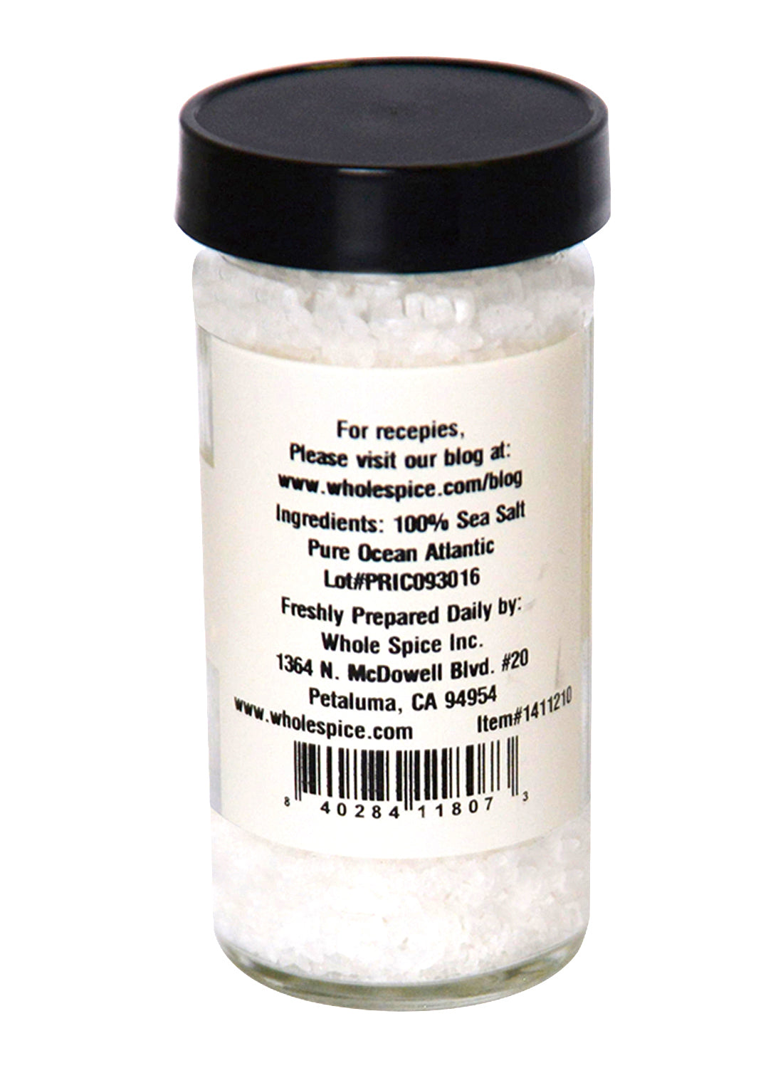 Whole Spice Inc. Sea Salt Coarse comes in a clear glass jar with a black lid, perfect for grinders. The white label features ingredient info, barcode, and Whole Spice Inc.'s address in Petaluma, CA.