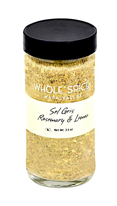 A jar of Whole Spice Inc. Rosemary Lemon Salt with a black lid.